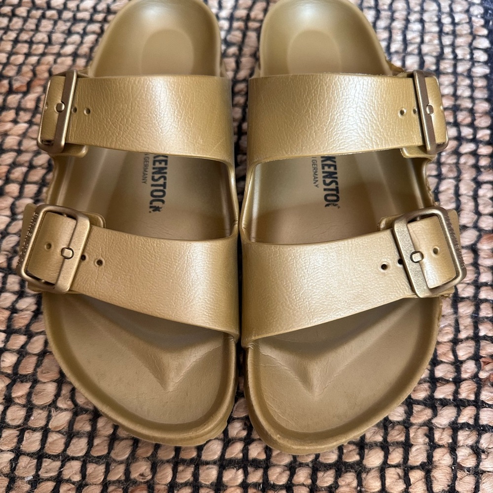 Birkenstock Arizona Essentials
EVA - Glamour Gold Metallic Sandals size 39